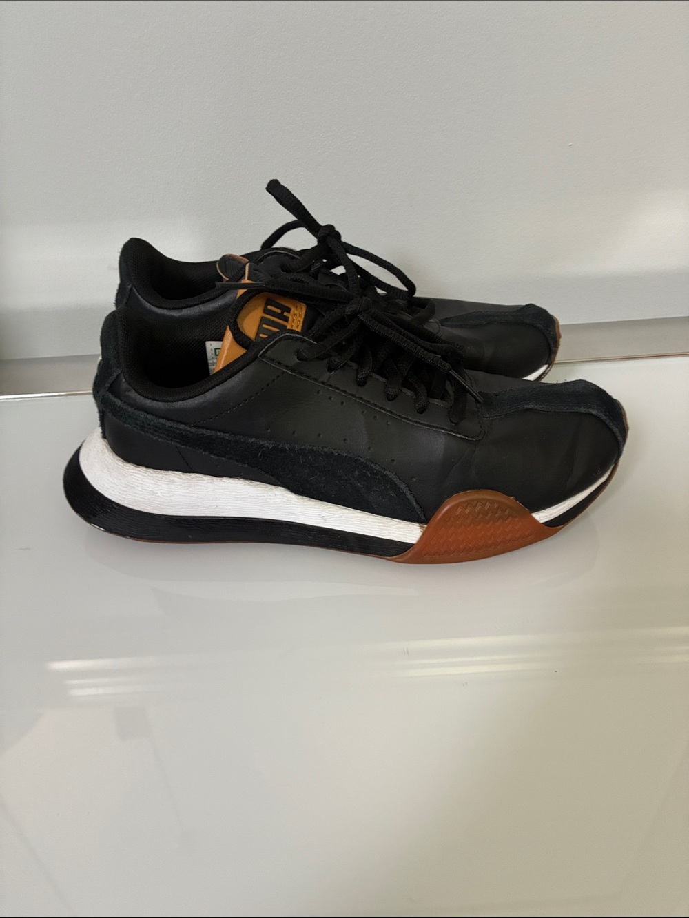 Puma Black Leather Sneakers with Brown and White Accents